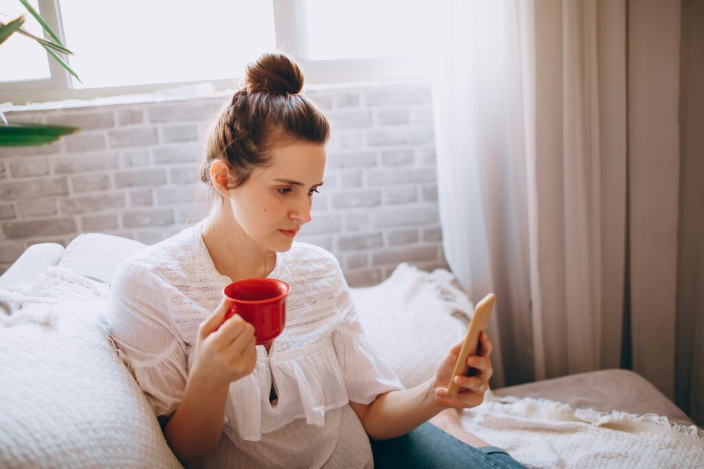 Person sitting alone contentedly, representing the self-sufficiency of avoidant attachment.