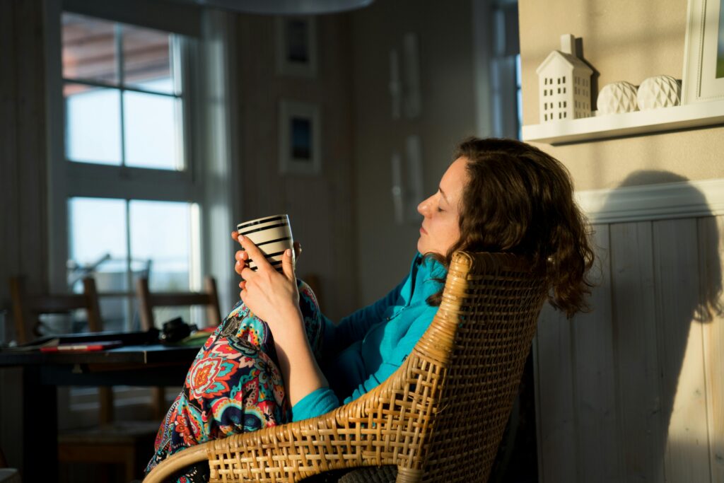 Parent taking a moment to regulate their own nervous system, an essential part of regulated parenting.